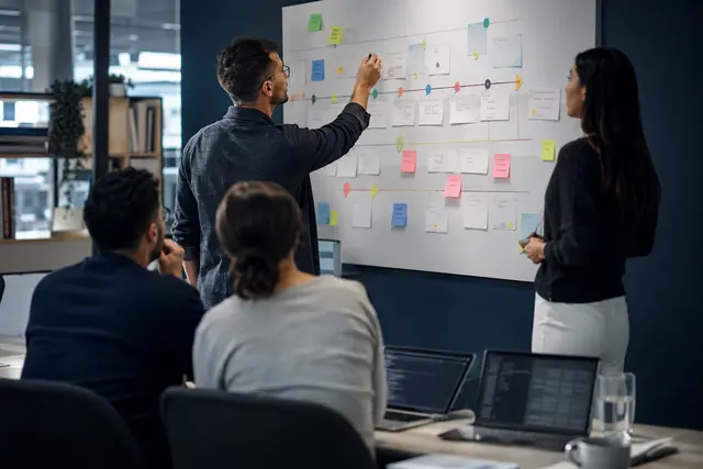 Photorealistic business concept for Zoho Projects: milestones, teamwork & delivery.